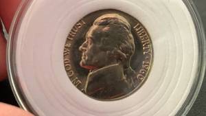 lot 11 image: 1960 Jefferson Nickel Coin Monticello on reverse in Protective Holder BU Brilliant Uncirculated