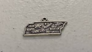 lot 20 image: Sterling Silver Tennessee State Charm with Landmarks - 1.8 grams