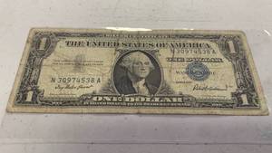 lot 25 image: One Dollar Silver Certificate Blue Seal Series 1957 Serial number N30974538A