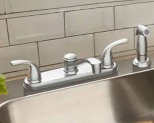 lot 14122 image: Dover Chrome Double Handle Low-arc Kitchen Faucet with Deck Plate and Side Spray
