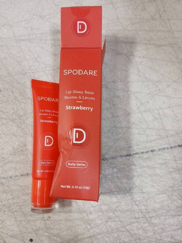 lot 41719 image: SPODARE Lip Shiny Balm Strawberry Flavor - Retail $8