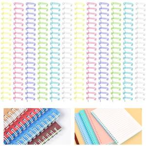 lot 23071 image: MANOPAWS 30Pcs Metal Double Loop Binding Wires Double Spiral Binding Ring Coil, 916 23 Holes, 21 Pitch Cinch Binding Machine Wire for Teacher Student Document Notebook File Making (Iridescence) - Retail $14