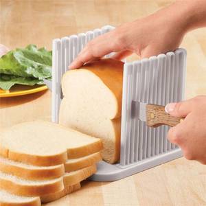 lot 30814 image: ORIONE Adjustable Toast SlicerCutting Guide for Homemade Bread, Plastic Bread Slicer Loaf for Slicing Bread Foldable Kitchen Baking Tools (White) - Retail $9