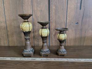 lot 15 image: Decorative Pillar Candle Holders Set of Three