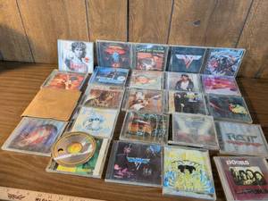 lot 35 image: Classic Rock CD Collection - Multiple Artists Including The Doors, Van Halen, Boston