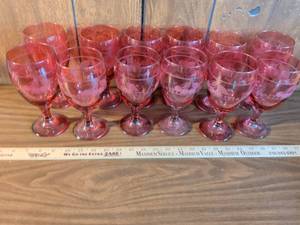 lot 52 image: Red Glass Wine Goblets with Etched Cherry Pattern Set of 12