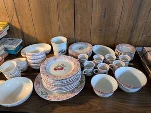 lot 53 image: Pfaltzgraff Red Fruit Pattern Dinnerware Set with Plates Bowls and Cups some may have chips please come to preview to look at them