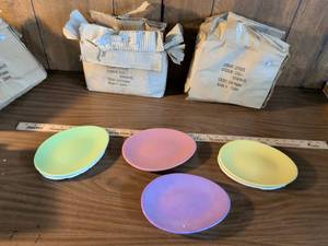 lot 55 image: Set of four egg Easter colorful plates three packages