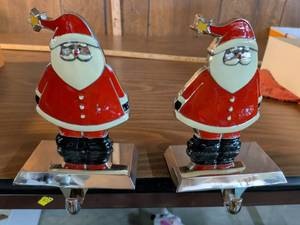 lot 93 image: Santa Claus Christmas Stocking Holders Set of 2