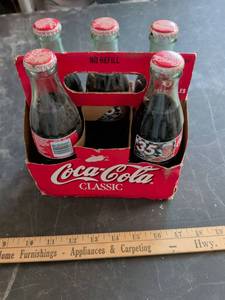 lot 145 image: Coca-Cola Classic Glass Bottles with NASCAR Racing Theme 6-Pack Carrier