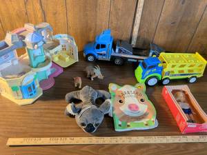 lot 164 image: Mixed Childrens Toy Lot with Trucks, Doll, Plush Animals and Playsets