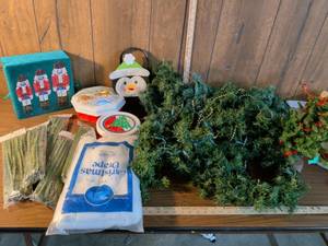 lot 177 image: Christmas Holiday Decoration Bundle - Artificial Garland, Tins, Penguin Bag, Nutcracker Canvas Art