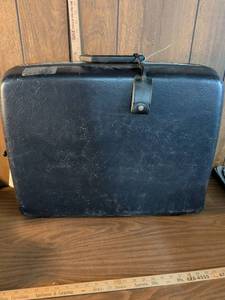 lot 213 image: Blue Hard Shell Rolling Suitcase with Wheels