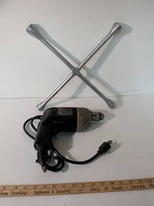 lot 240 image: Black & Decker Electric Drill with 4-Way Lug Wrench