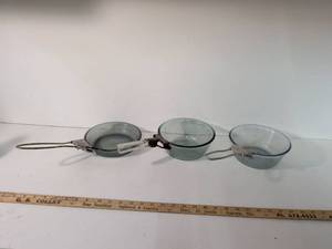 lot 249 image: Pyrex Glass Saucepan Set with Metal Handles