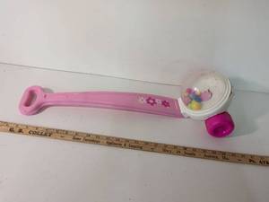 lot 304 image: Pink Fisher-Price Baby Push Toy with Rattle Ball
