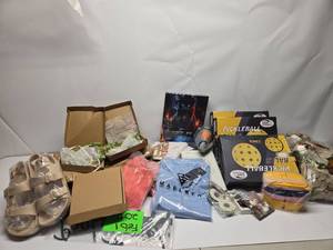 lot 200 image: Mixed Lot of Assorted Items Including Clothing, Games, and Accessories
