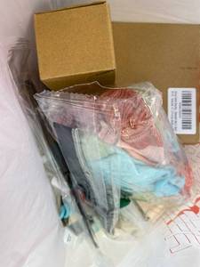 lot 421459 image: 15 Item Mystery Bag (misc. makeup, phone accessories, electronics, toys, stuffed animals, keychains, household items, etc.)