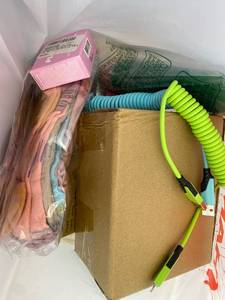 lot 421461 image: 15 Item Mystery Bag (misc. makeup, phone accessories, electronics, toys, stuffed animals, keychains, household items, etc.)