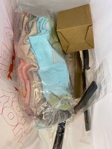 lot 421462 image: 15 Item Mystery Bag (misc. makeup, phone accessories, electronics, toys, stuffed animals, keychains, household items, etc.)