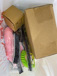 lot 421465 image: 15 Item Mystery Bag (misc. makeup, phone accessories, electronics, toys, stuffed animals, keychains, household items, etc.)