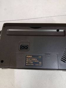 lot 24507 image: PRUNUS J03 AM FM Radio Portable Plug in Wall or AA Battery Operated for HomeOutdoor, Large Speaker Excellent Sound and Reception, Large Tuning Knobs, Gifts for Seniors, No,Internet RadioShower Radio - Retail $19