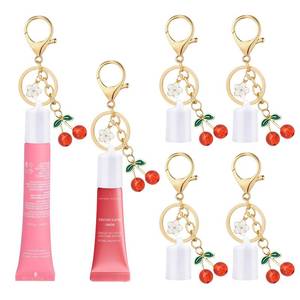 lot 30958 image: Fizzlup 2pk Lip Gloss Keychain, Lip Balm Keychain Cap for Summer Fridays Lid Lipgloss Holder Key Chain Screw Top With Cherry Charms Portable Accessories - Retail $8