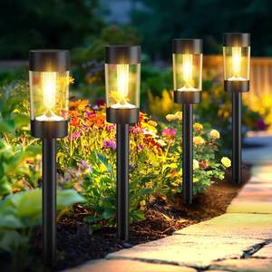 lot 24514 image: Eyrosa Solar Lights Outdoor, 12 Pack Waterproof Solar Landscape Lighting for Pathway Garden Yard Path Walkway Driveway Lawn Patio Outside Decor, Warm White - Retail $34