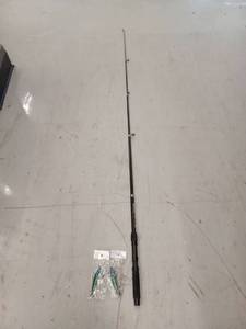 lot 14329 image: 1 Fishing Pole And 2 Lures