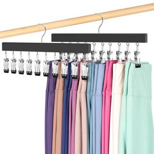 lot 14181 image: Legging Organizer for Closet, Pants Hangers with Clips Holds 20 Leggings, Jeans, Hats, Shorts, Socks, 360° Rotating Space Saving Hanging Lightweight Garment Hanger Storage 2Pcs