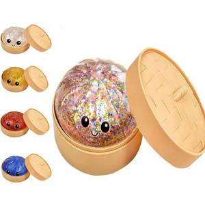 lot 14238 image: Glitter Dumpling Squishy, 2026 New Bun Squeeze Stress Relief Ball with Steamer Box for Stress Relief, More Surprises (Rainbow)