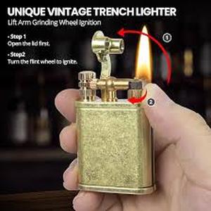 lot 11805 image: Gold-Tone Flip Top Lighter with Accessories in Metal Case