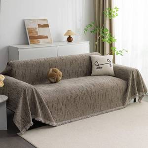 lot 1489 image: MYSKY HOME Boho Couch Cover Sand Sofa Covers with Tassel Farmhouse Sofa Slipcover Simple Couch Protector for Dogs Chenille Sectional Couch Covers L Shaped Couch Cushion Covers, 71x 134