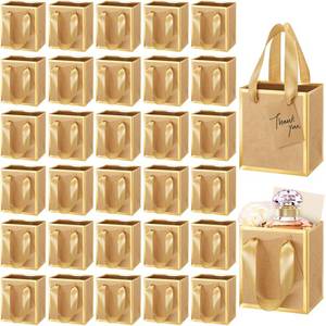 lot 1490 image: Yeaqee 50 Pcs Mini Metallic Paper Gift Bags with Handles 4x2.75x4.5 Tiny Small Gift Bags with Thank You Tag for Wedding Graduation Birthday Party Return Gifts Jewelry Business (Kraft,Gold)