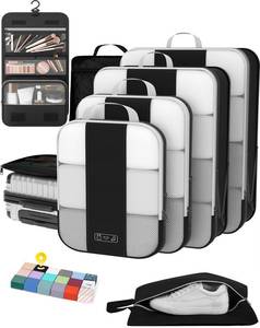 lot 2066 image: 8 Set Compression Packing Cubes for Travel Essentials,Compressible Expandable Packing Cubes for Suitcase,OlarHike Luggage Organizer Bags for Travel,Handy Helper for Organizing Clothes(Black)