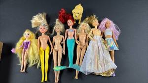 lot 130 image: Barbie and Other FashionMovie Doll Collection with Dog Pet
