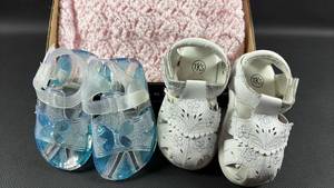 lot 153 image: Baby Girl Pink Crocheted Blanket and Sandal Set