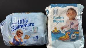 lot 157 image: Swim Diapers Huggies (13 pants,24-34 lbs) and Hello Bello (13 pants, 18-34 lbs) Brands