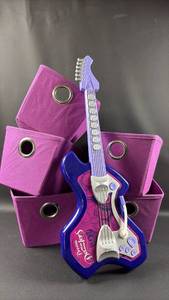 lot 160 image: Electronic Guitar Toy with (5)Purple Storage Bins (Approximately 7 by 7 by 10 inches)