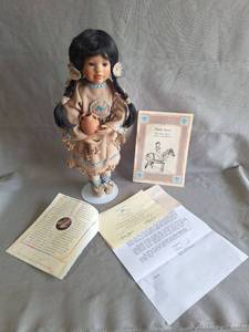 lot 91 image: DISCONTINUED Many Stars Native American Porcelain Doll with Certificate