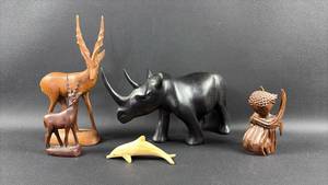 lot 12 image: Hand Carved Wooden African Animals and Platt   79 Angel Figurine Collection