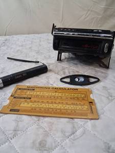 lot 7 image: Micro Eight 8-Track Player with Machining Calculator and Laser Tool Set