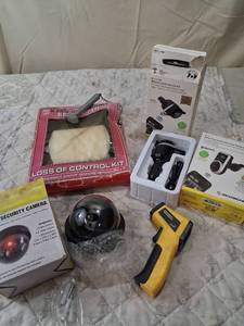 lot 33 image: Electronics and Gadgets Mixed Lot - Bluetooth Car Kit, Fake Security Camera, Temperature Gun