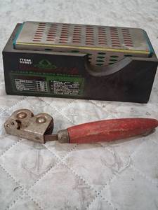 lot 40 image: 4-Sided Hone Knife Sharpener with Red Handle Hone Tool