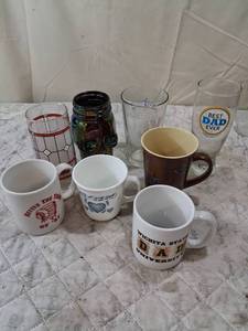 lot 72 image: Mixed Collection of Coffee Mugs and Iridescent Glass Skull Container