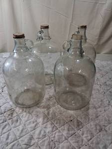 lot 73 image: One Gallon Glass Jugs with Cork Stoppers