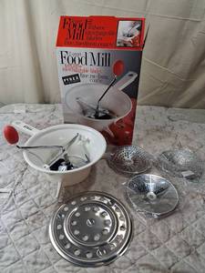 lot 86 image: Pyrex 2 Quart Food Mill with Interchangeable Blades