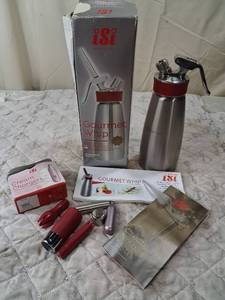 lot 89 image: iSi Gourmet Whip Plus Stainless Steel Whipped Cream Dispenser with Cream Chargers
