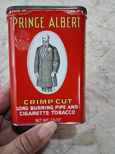 lot 98 image: Prince Albert Crimp Cut Tobacco Tin by R.J. Reynolds