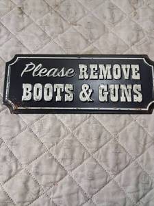 lot 102 image: Please Remove Boots & Guns Metal Sign